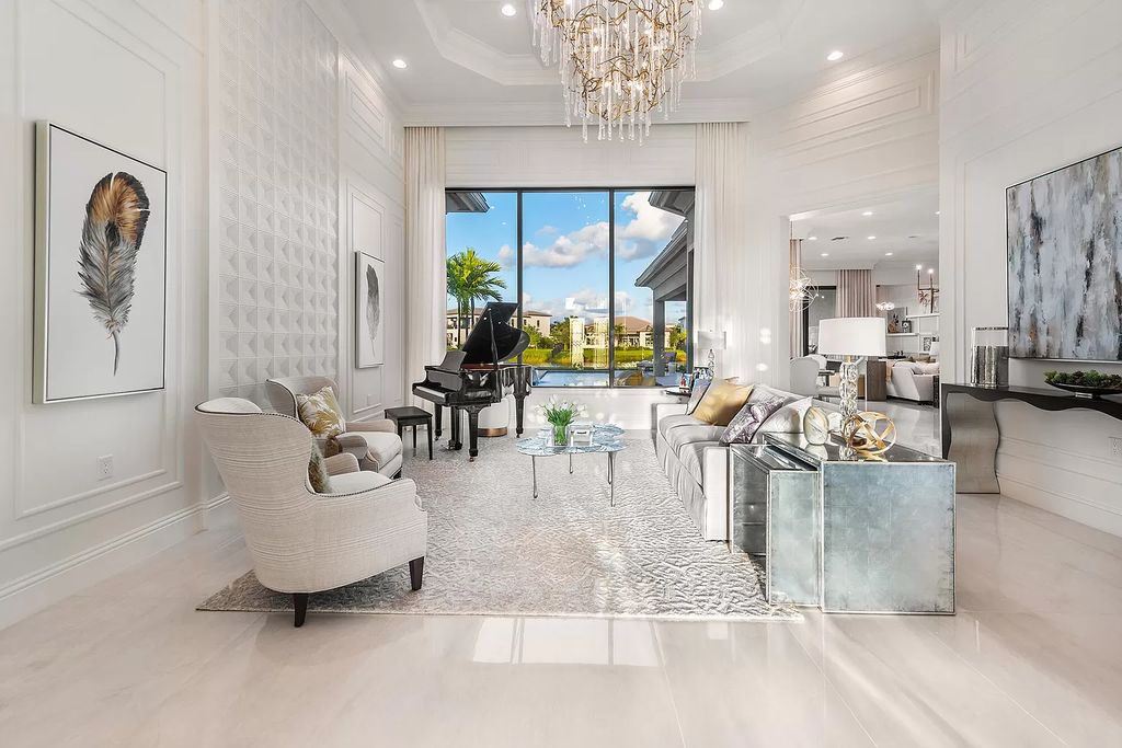 The Home in Boca Raton is a stunning transitional one story estate has Amazing custom pool with spill over spa and natural stone decking now available for sale. This home located at 17236 Brulee Breeze Way, Boca Raton, Florida