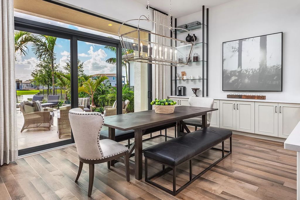 The Boca Raton Home with 2 story open great room concept floorplan and an amazing contemporary spill over pool now available for sale. This home located at 17167 Ludovica Ln, Boca Raton, Florida