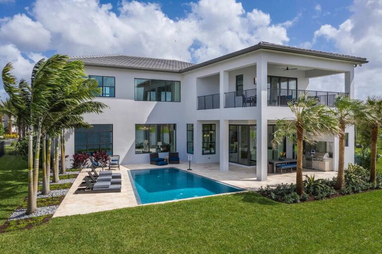 This $3,600,000 Newly Built Modern Home in Boca Raton offers a Magnificent Fountain Lakeview