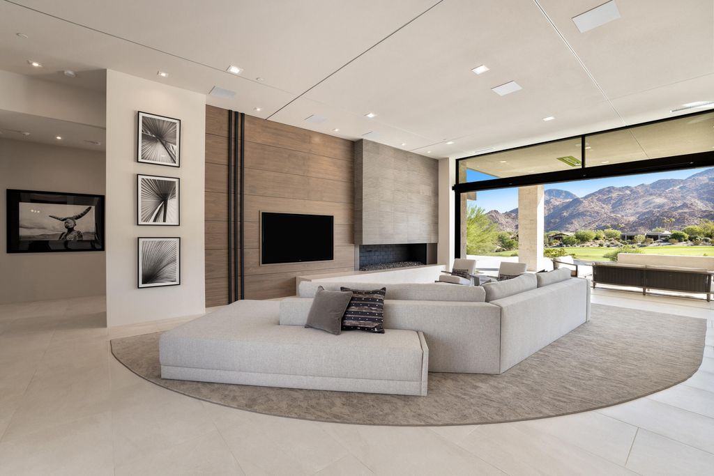 The Home in Indian Wells is a contemporary estate with architecturally stunning design and incredible mountain views now available for sale. This home located at 50806 Desert Arroyo Trl, Indian Wells, California