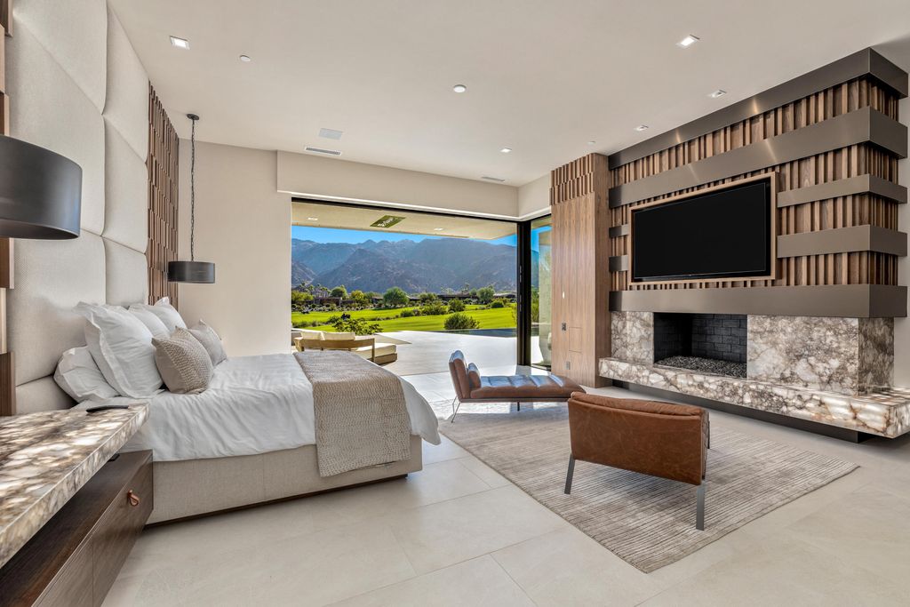 The Home in Indian Wells is a contemporary estate with architecturally stunning design and incredible mountain views now available for sale. This home located at 50806 Desert Arroyo Trl, Indian Wells, California