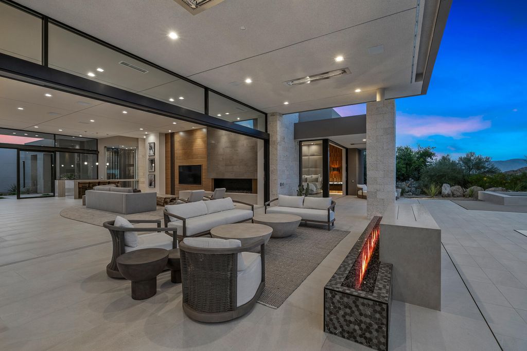 The Home in Indian Wells is a contemporary estate with architecturally stunning design and incredible mountain views now available for sale. This home located at 50806 Desert Arroyo Trl, Indian Wells, California