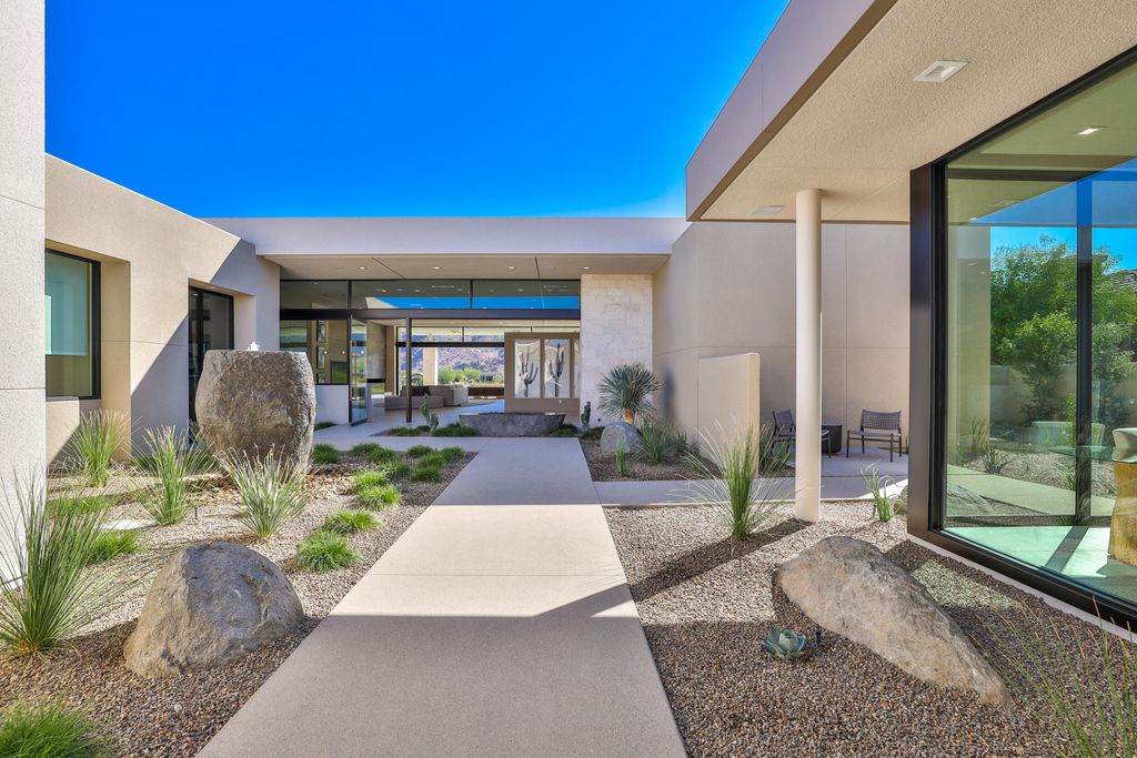 The Home in Indian Wells is a contemporary estate with architecturally stunning design and incredible mountain views now available for sale. This home located at 50806 Desert Arroyo Trl, Indian Wells, California