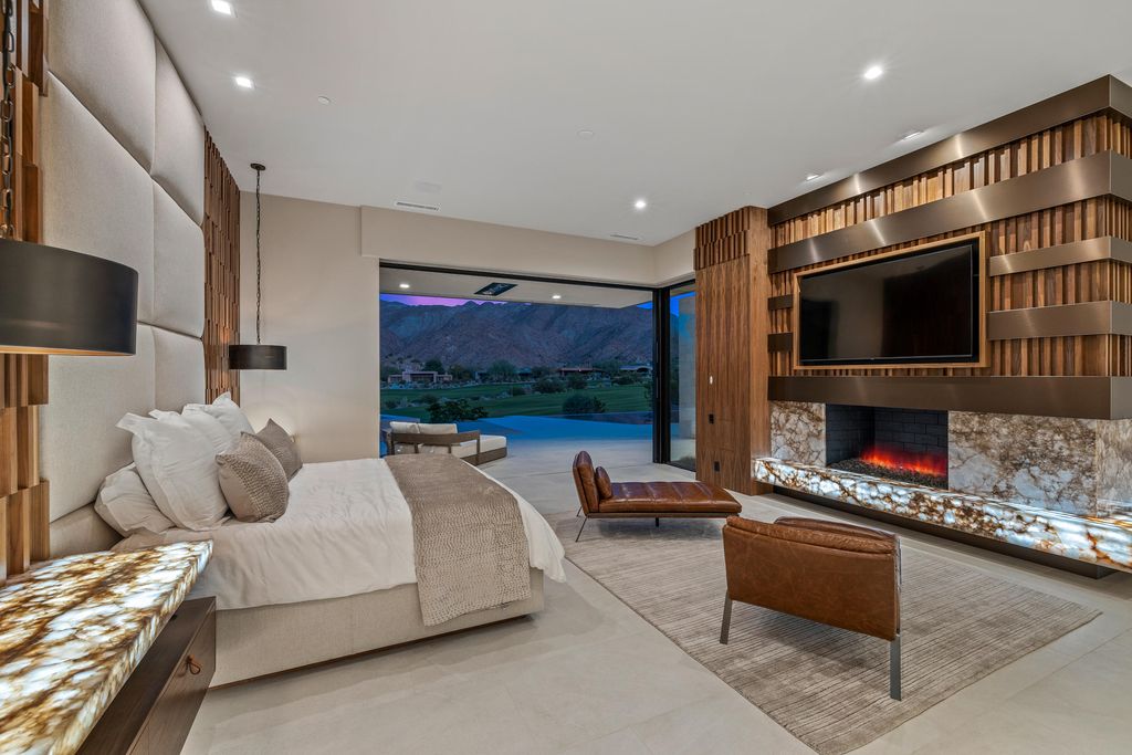 The Home in Indian Wells is a contemporary estate with architecturally stunning design and incredible mountain views now available for sale. This home located at 50806 Desert Arroyo Trl, Indian Wells, California