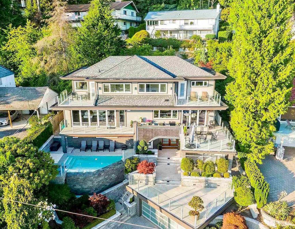 The Exquisite Property in North Vancouver features ocean & city views now available for sale. This home is located at 380 Newdale Ct, North Vancouver, BC V7N 3H4, Canada
