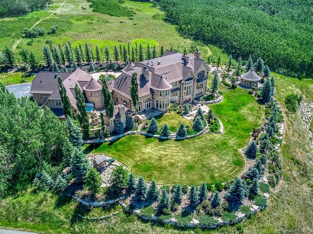 The Extraordinary French Chateau in Alberta offers grand luxurious living now available for sale. This home is located at 25130 Escarpment Ridge Vw, Rocky View County, AB T3Z 3M7, Canada