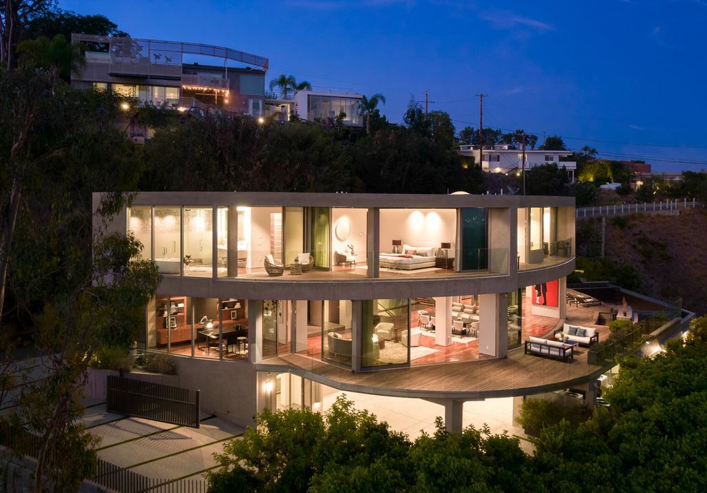 The Home in Los Angeles is an impeccably crafted three-story contemporary masterpiece with explosive, panoramic views now available for sale. This home located at 1227 N Tigertail Rd, Los Angeles, California