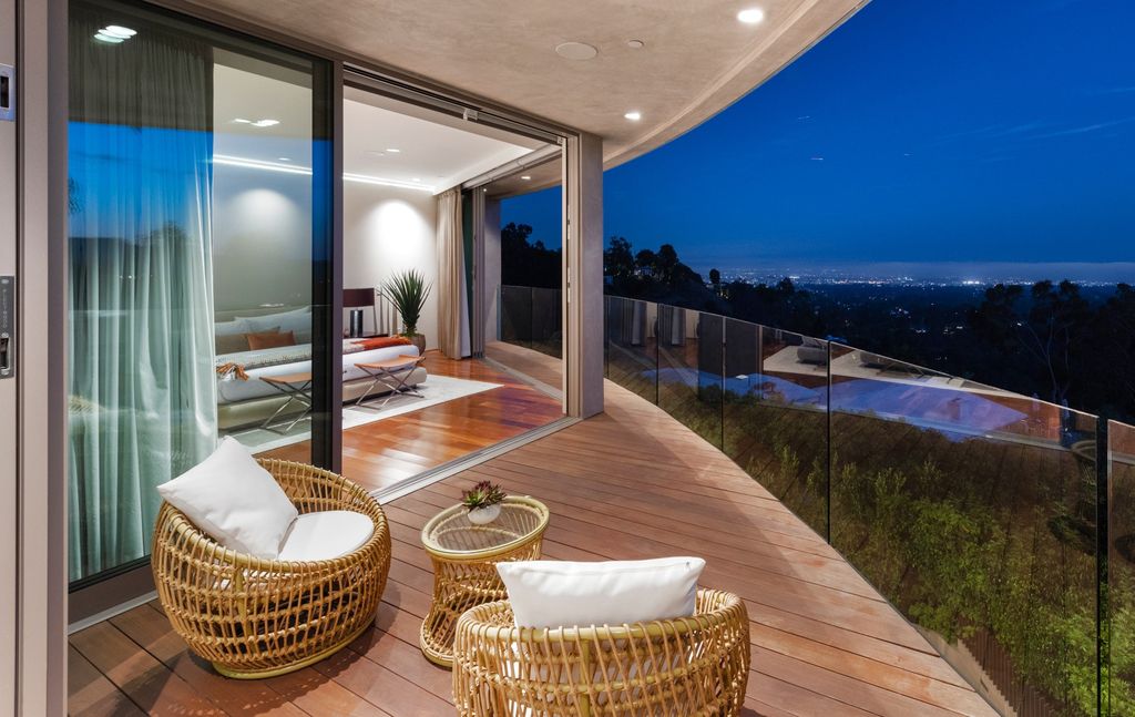 The Home in Los Angeles is an impeccably crafted three-story contemporary masterpiece with explosive, panoramic views now available for sale. This home located at 1227 N Tigertail Rd, Los Angeles, California