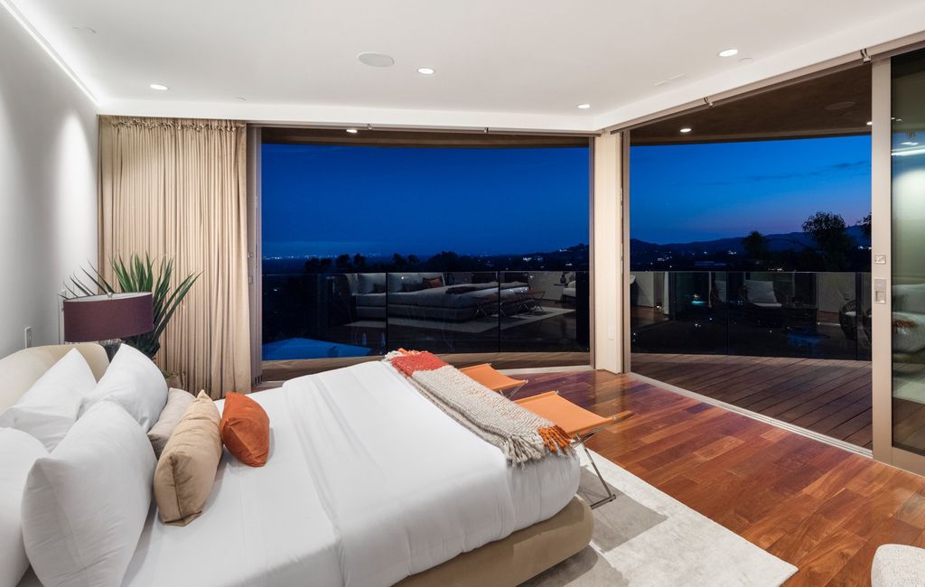 The Home in Los Angeles is an impeccably crafted three-story contemporary masterpiece with explosive, panoramic views now available for sale. This home located at 1227 N Tigertail Rd, Los Angeles, California