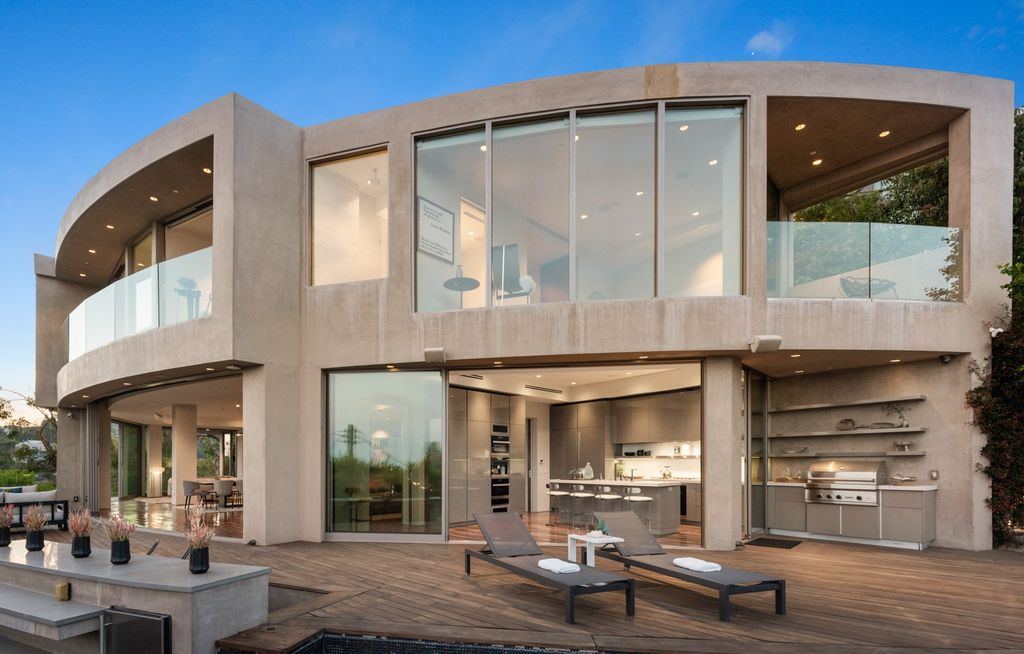 The Home in Los Angeles is an impeccably crafted three-story contemporary masterpiece with explosive, panoramic views now available for sale. This home located at 1227 N Tigertail Rd, Los Angeles, California