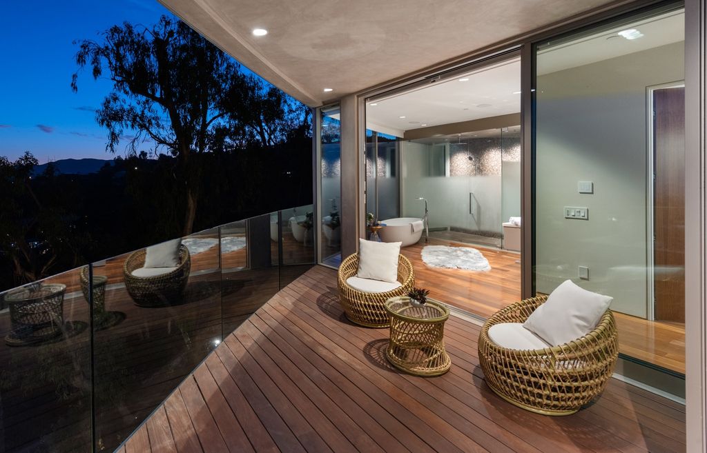 The Home in Los Angeles is an impeccably crafted three-story contemporary masterpiece with explosive, panoramic views now available for sale. This home located at 1227 N Tigertail Rd, Los Angeles, California