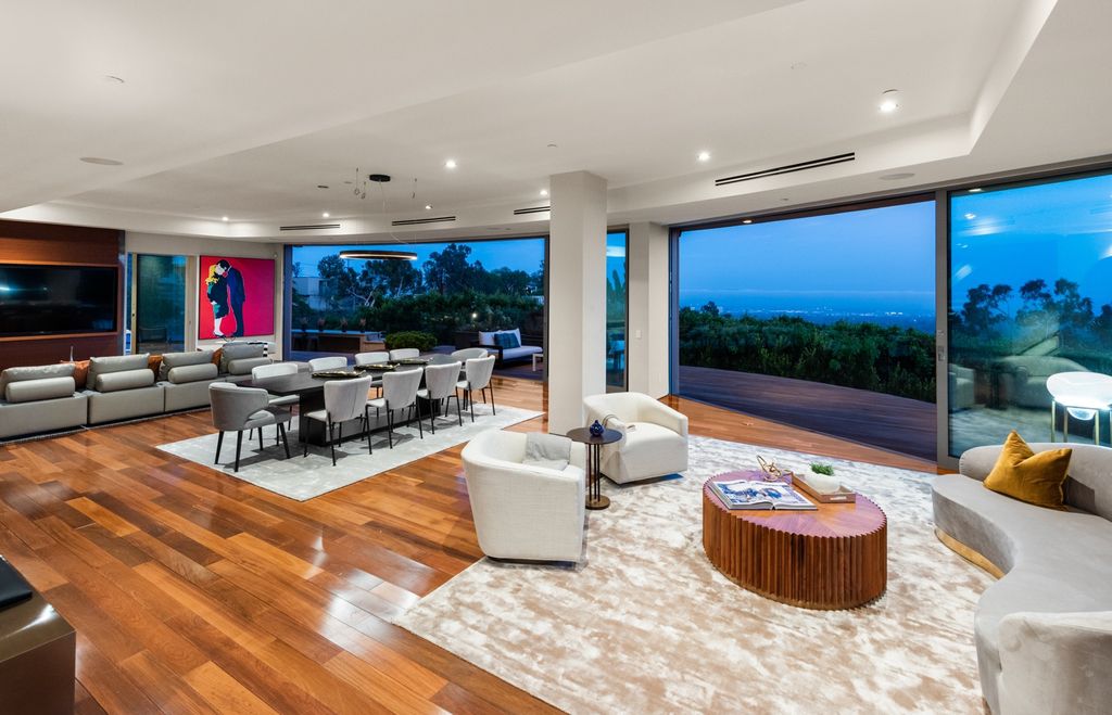 The Home in Los Angeles is an impeccably crafted three-story contemporary masterpiece with explosive, panoramic views now available for sale. This home located at 1227 N Tigertail Rd, Los Angeles, California