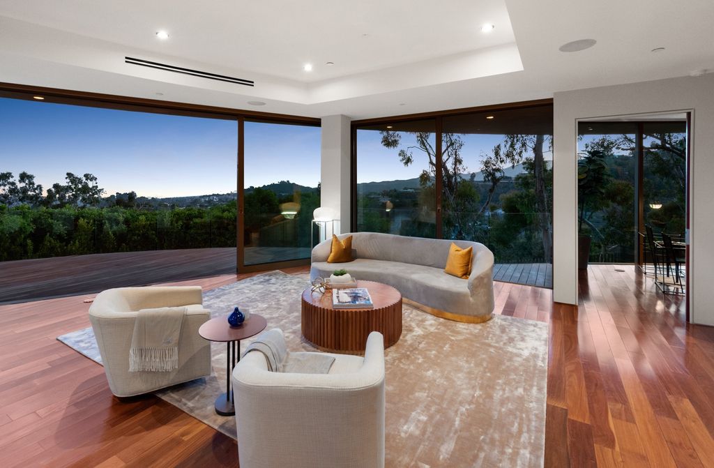 The Home in Los Angeles is an impeccably crafted three-story contemporary masterpiece with explosive, panoramic views now available for sale. This home located at 1227 N Tigertail Rd, Los Angeles, California