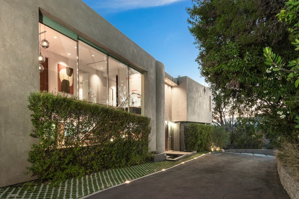 The Home in Los Angeles is an impeccably crafted three-story contemporary masterpiece with explosive, panoramic views now available for sale. This home located at 1227 N Tigertail Rd, Los Angeles, California