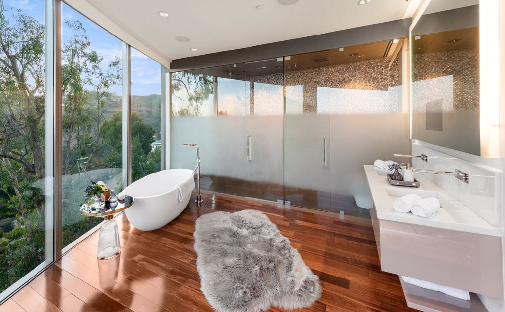 The Home in Los Angeles is an impeccably crafted three-story contemporary masterpiece with explosive, panoramic views now available for sale. This home located at 1227 N Tigertail Rd, Los Angeles, California