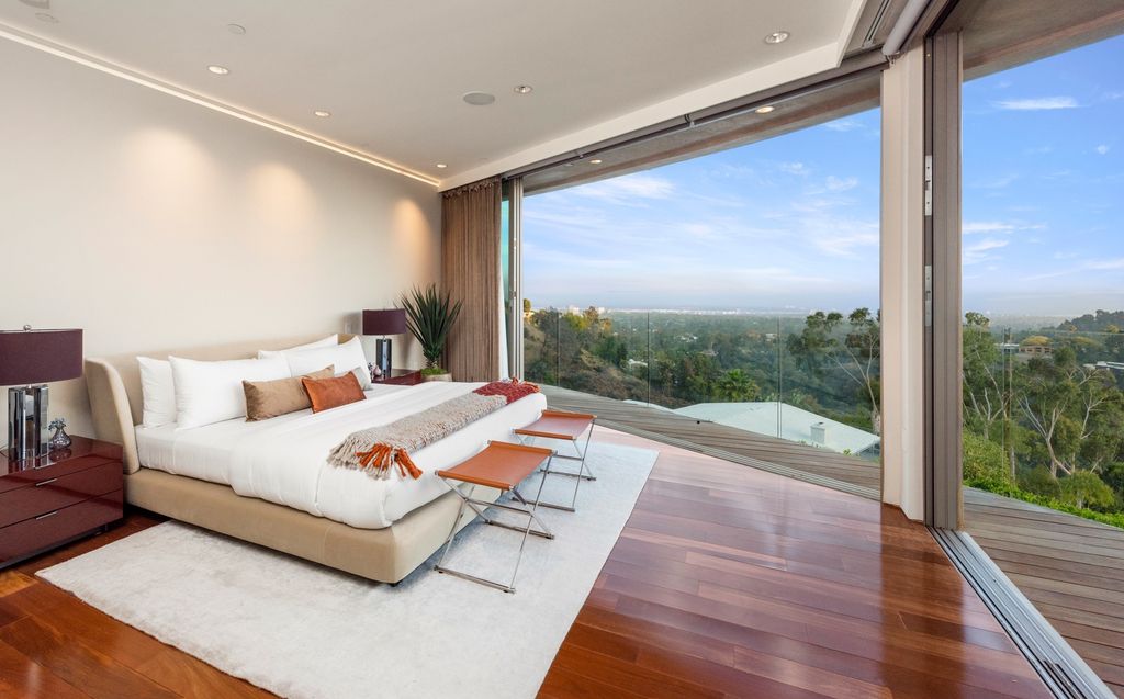 The Home in Los Angeles is an impeccably crafted three-story contemporary masterpiece with explosive, panoramic views now available for sale. This home located at 1227 N Tigertail Rd, Los Angeles, California