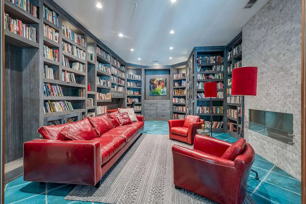 A glossy red fabric sofa set reminiscent of the 70s-80s combined with two-floor lamps makes this living room and the reading room unique. This living room idea with red color is the perfect expression of both retro, modern, and of course chic as well. 