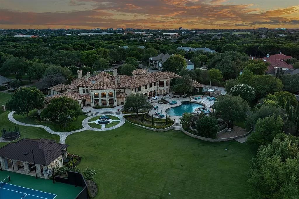 The Home in Plano is a gated residence built and designed by Lloyd Lumpkins offers modern touches, and endless views now available for sale.