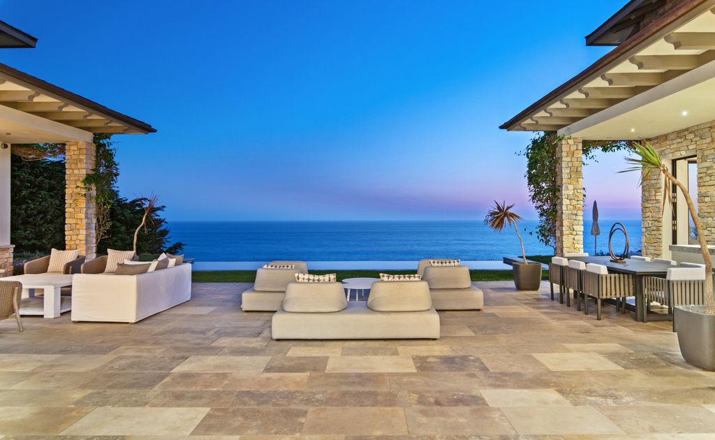 The Malibu Villa is a luxurious estate offers extravagant comfort and commands unobstructed sunrise-to-sunset ocean and island views available for sale. This home located at 11802 Ellice Street, Malibu, Califoria