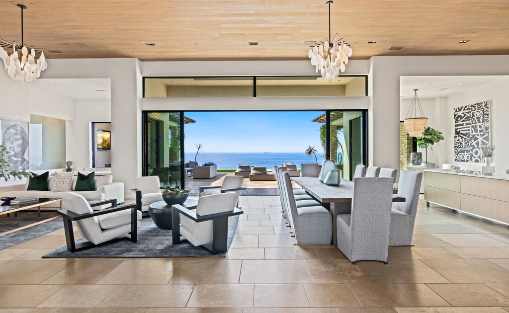 The Malibu Villa is a luxurious estate offers extravagant comfort and commands unobstructed sunrise-to-sunset ocean and island views available for sale. This home located at 11802 Ellice Street, Malibu, Califoria