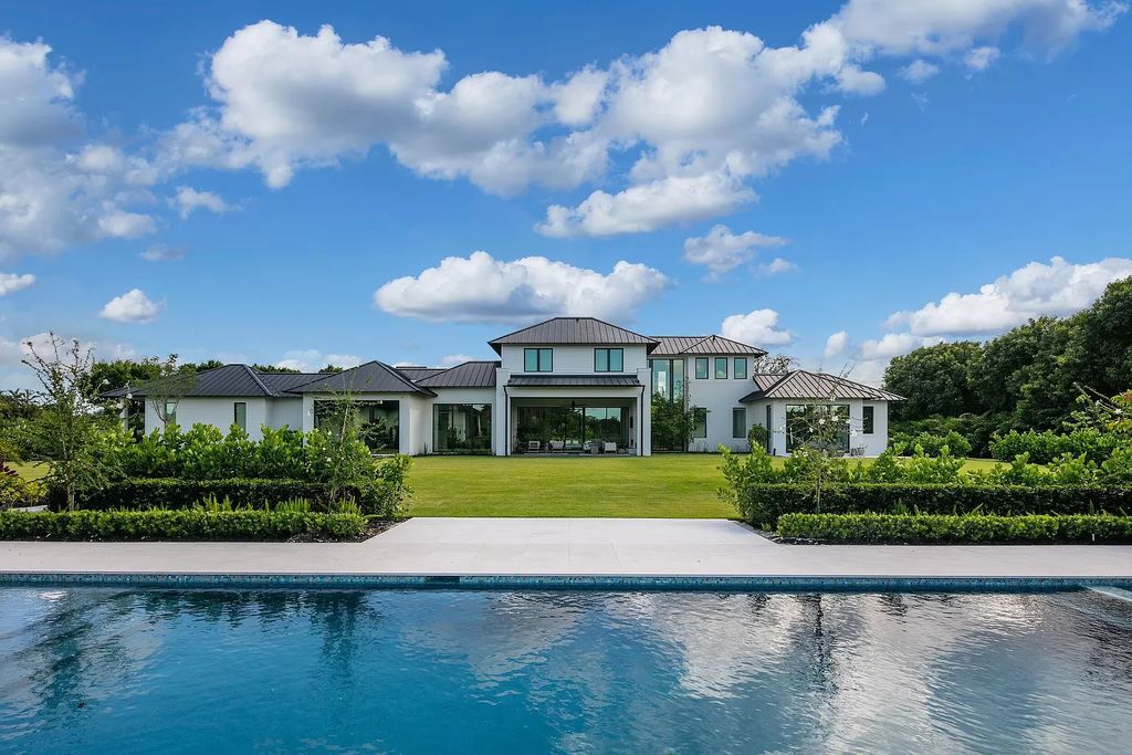 The Home in Delray Beach is a custom multidimensional compound offering rich organic design with finest materials now available for sale. This home located at 10467 El Caballo Ct, Delray Beach, Florida