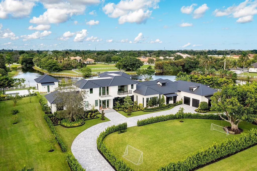 The Home in Delray Beach is a custom multidimensional compound offering rich organic design with finest materials now available for sale. This home located at 10467 El Caballo Ct, Delray Beach, Florida