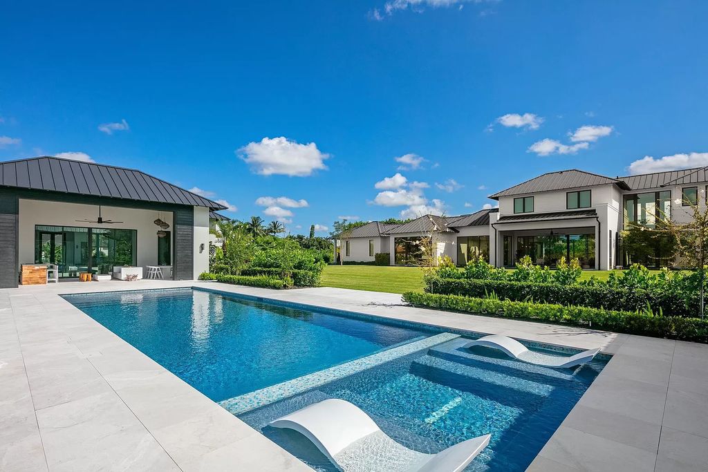 The Home in Delray Beach is a custom multidimensional compound offering rich organic design with finest materials now available for sale. This home located at 10467 El Caballo Ct, Delray Beach, Florida