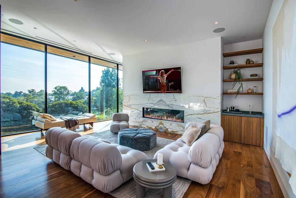 The Mansion in Bel Air is a glass-encased home designed by renowned architect Paul McClean masterfully nestled amongst lush now available for sale.