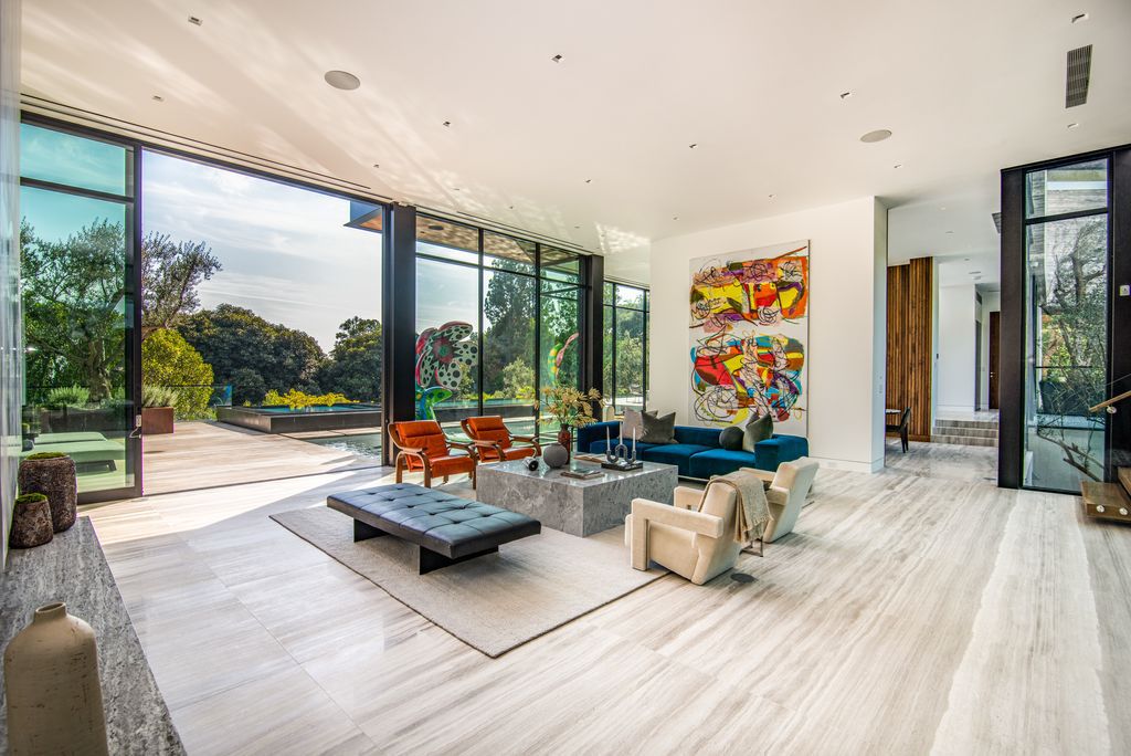 The Mansion in Bel Air is a glass-encased home designed by renowned architect Paul McClean masterfully nestled amongst lush now available for sale.