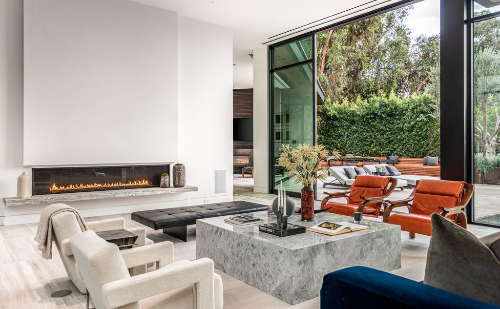 The Mansion in Bel Air is a glass-encased home designed by renowned architect Paul McClean masterfully nestled amongst lush now available for sale.