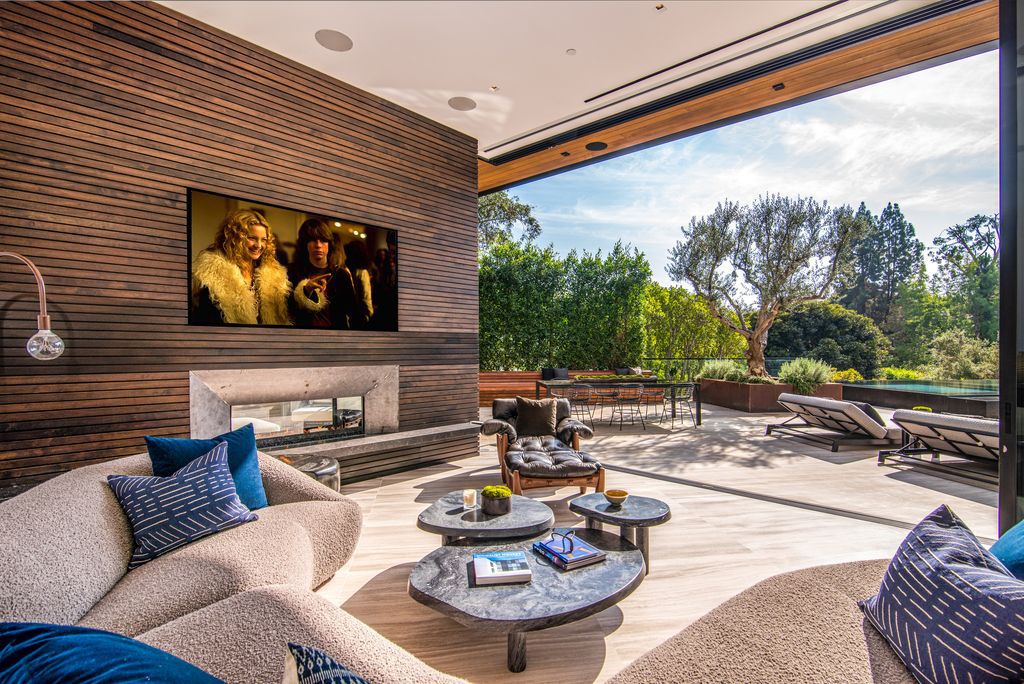 The Mansion in Bel Air is a glass-encased home designed by renowned architect Paul McClean masterfully nestled amongst lush now available for sale.