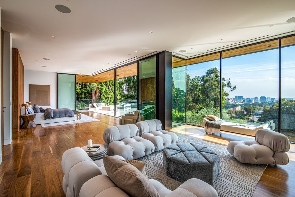 The Mansion in Bel Air is a glass-encased home designed by renowned architect Paul McClean masterfully nestled amongst lush now available for sale.