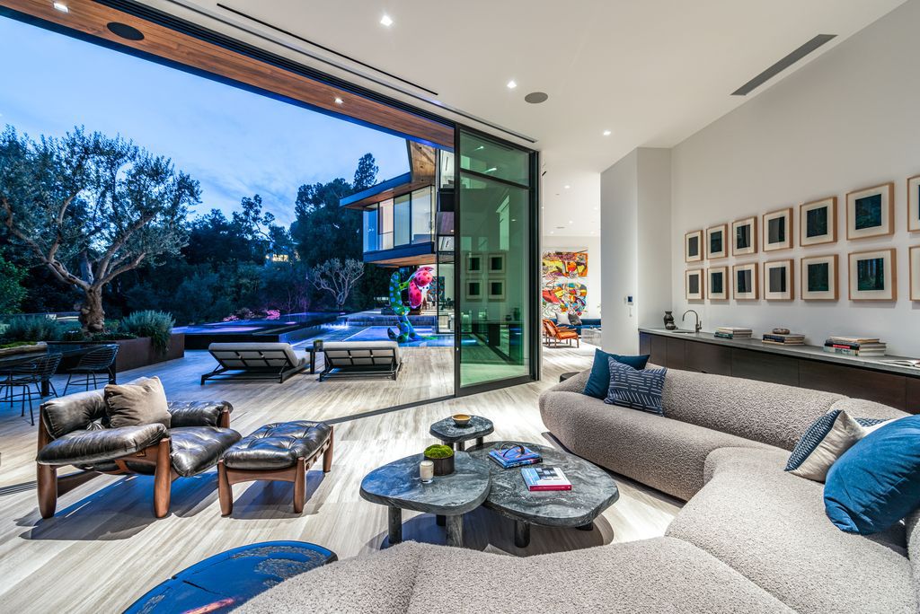 The Mansion in Bel Air is a glass-encased home designed by renowned architect Paul McClean masterfully nestled amongst lush now available for sale.