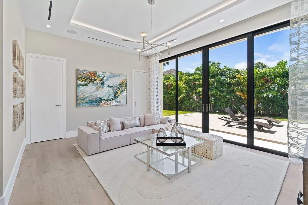 The Home in Boca Raton is a brand new turnkey modern estate located in the world-renowned Royal Palm Yacht & CC now available for sale. This home located at 2391 Areca Palm Rd, Boca Raton, Florida