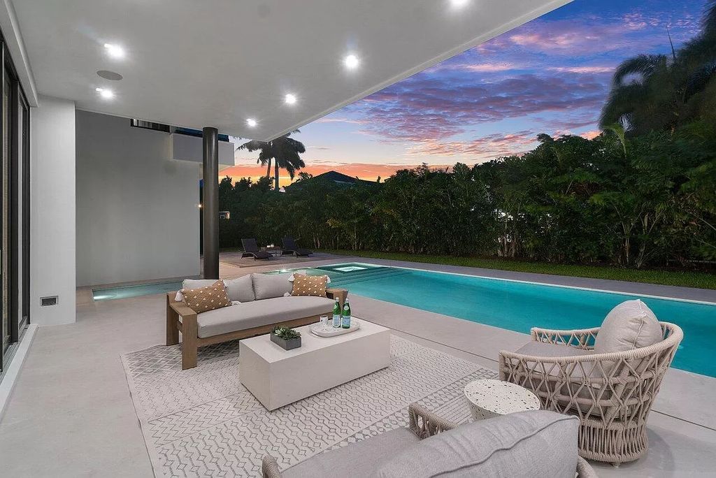 The Home in Boca Raton is a brand new turnkey modern estate located in the world-renowned Royal Palm Yacht & CC now available for sale. This home located at 2391 Areca Palm Rd, Boca Raton, Florida