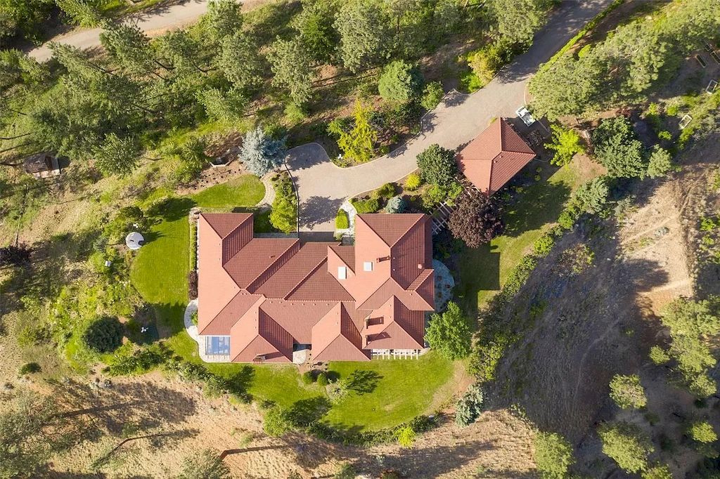 The Gated Hilltop Estate in Kelowna is a truly exceptional home now available for sale. This home is located at 2834 Belgo Rd, Kelowna, BC V1P 1E2, Canada