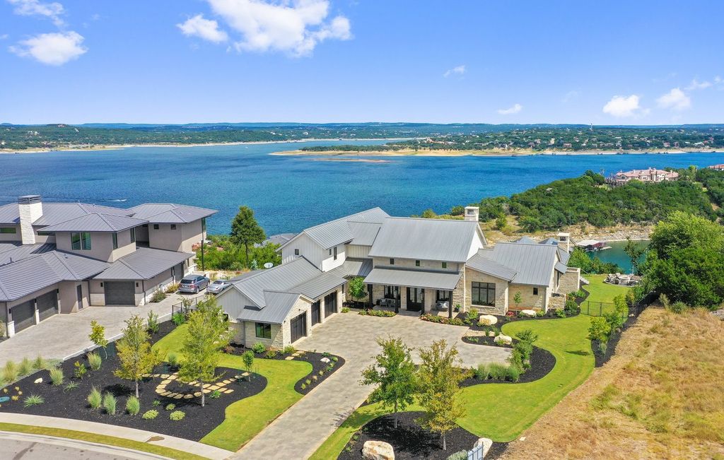 The Farmhouse in Austin is a masterfully crafted home perfectly situated to take in the breathtaking views of Lake Travis now available for sale. This home located at 613 Schickel Ter, Austin, Texas