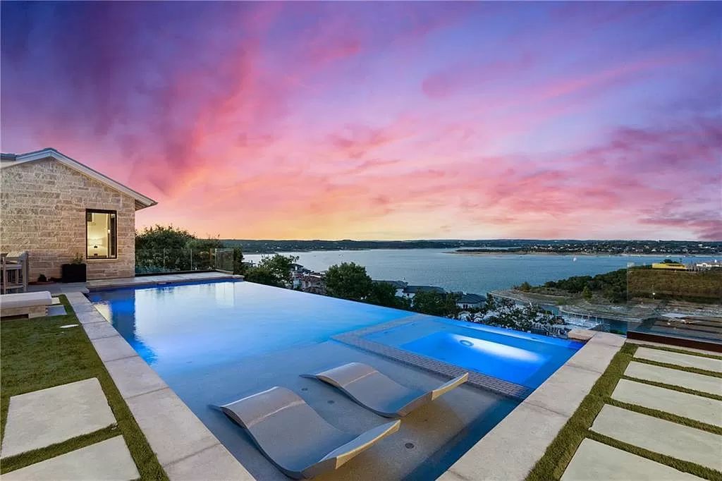 The Farmhouse in Austin is a masterfully crafted home perfectly situated to take in the breathtaking views of Lake Travis now available for sale. This home located at 613 Schickel Ter, Austin, Texas