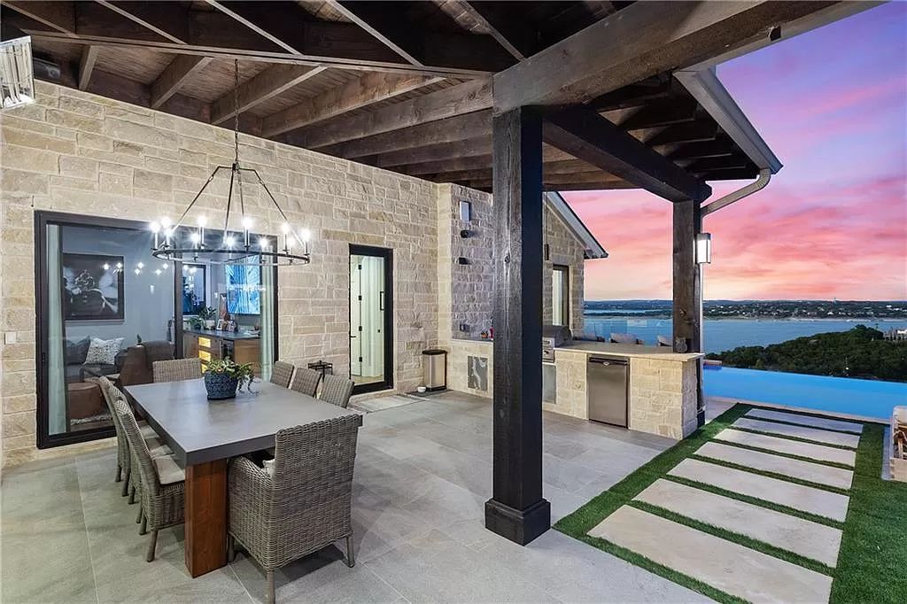 The Farmhouse in Austin is a masterfully crafted home perfectly situated to take in the breathtaking views of Lake Travis now available for sale. This home located at 613 Schickel Ter, Austin, Texas