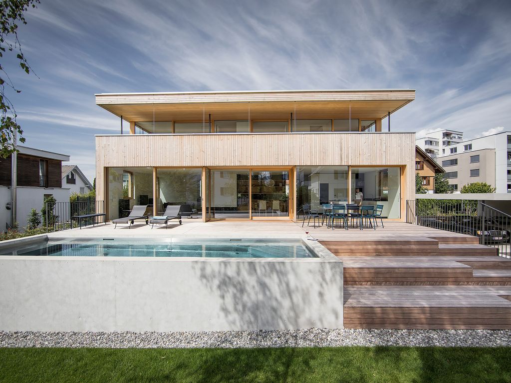 House STA, Two-storey Wooden Home by Dietrich Untertrifaller Architekten