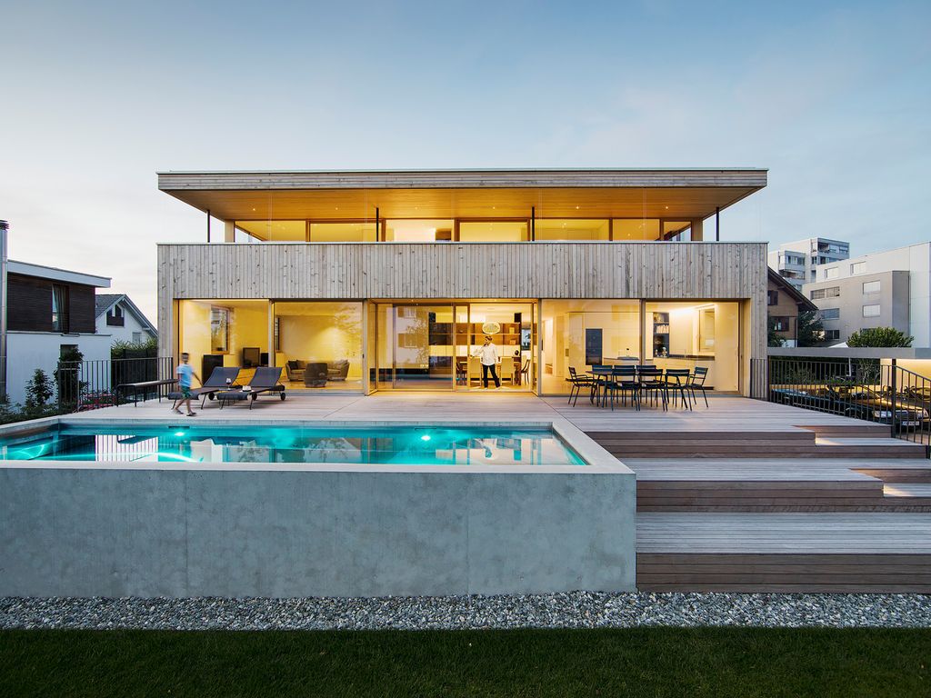 House STA, Two-storey Wooden Home by Dietrich Untertrifaller Architekten