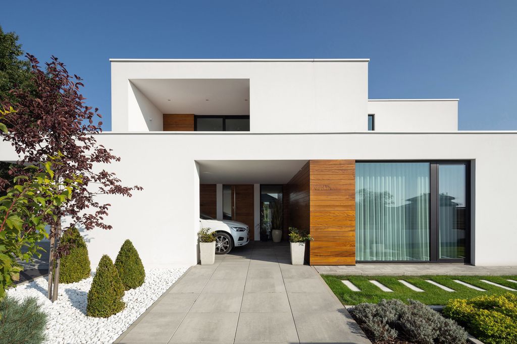 House with Niches, Combines Elegant White Blocks by RS + Robert Skitek