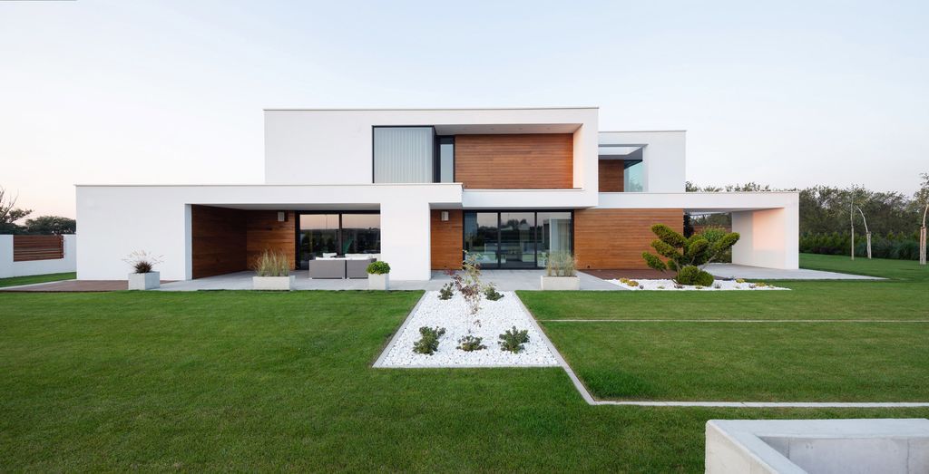 House with Niches, Combines Elegant White Blocks by RS + Robert Skitek