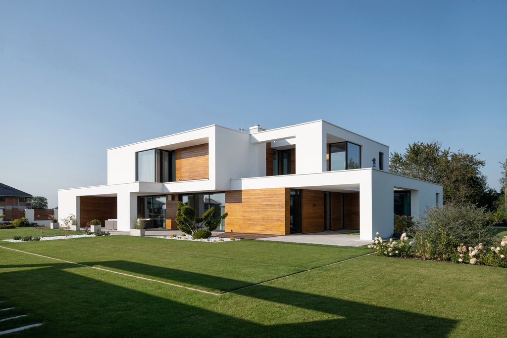 House with Niches, Combines Elegant White Blocks by RS + Robert Skitek