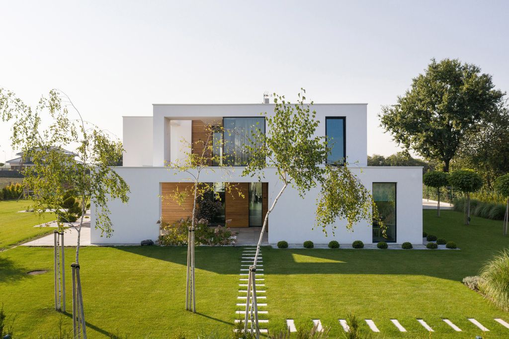 House-with-Niches-Combines-Elegant-White-Blocks-by-RS-Robert-Skitek-38