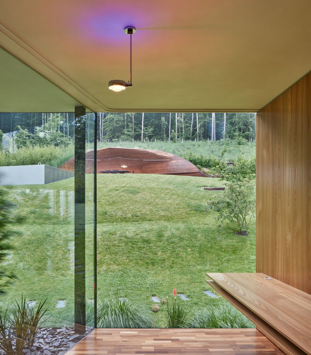 Lazy House Sits Between a Forest and a Valley by  Petrjanda/ Brainwork