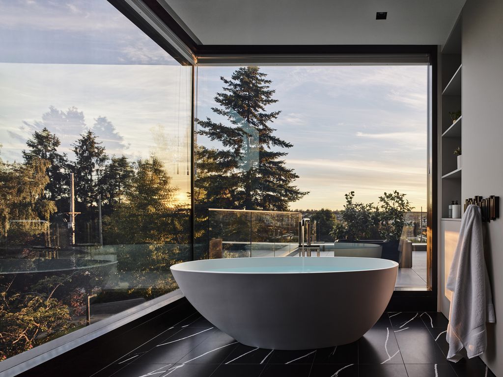 To make the most of the million dollar landscape outside your bathroom, prioritize the use of glass walls or glass windows with huge frames to make the most of natural light as well as you can admire the majestic views from every corner of the room. Such a truly a masterpiece that makes you unable to take your eyes off it.