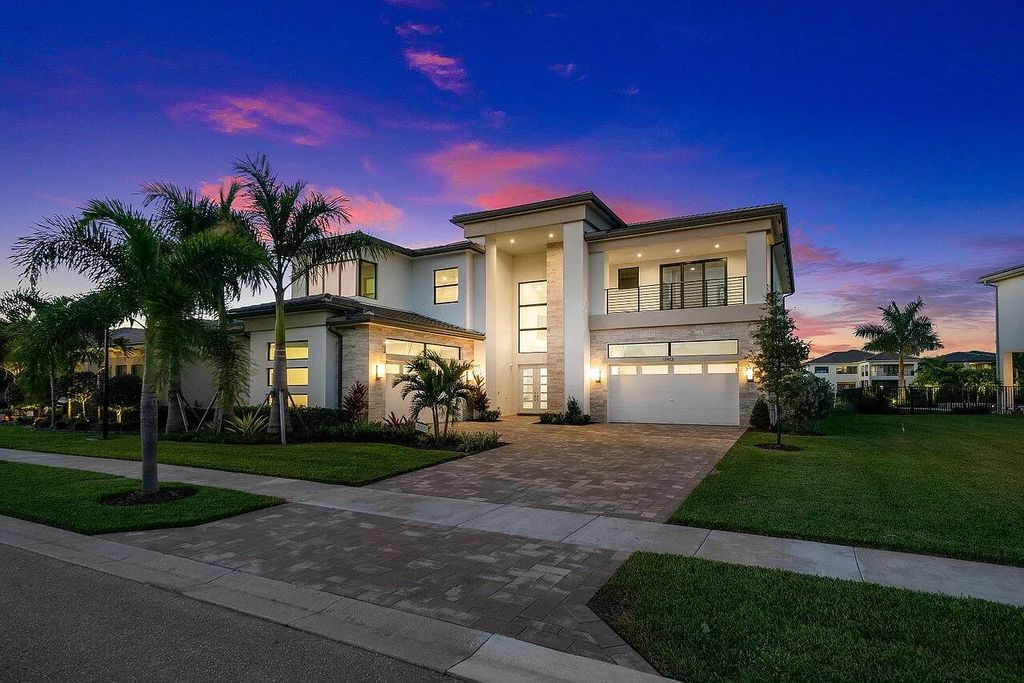 The Home in Boca Raton is a new transitional contemporary estate in the community of Boca Bridges with lake views now available for sale. This home located at 17413 Rosella Rd, Boca Raton, Florida