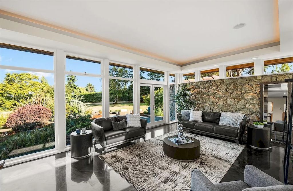 The Spectacular Beachfront Estate in Saanich is a luxury home now available for sale. This home is located at 5605 Parker Ave, Saanich, BC V8Y 2N2, Canada