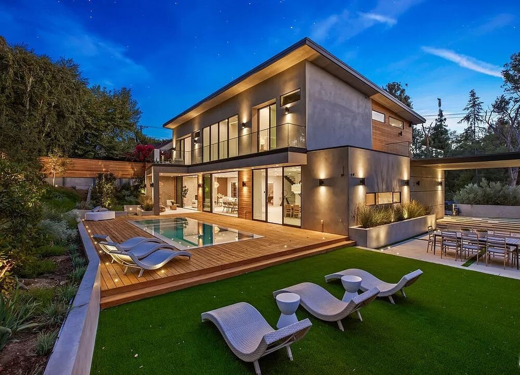 The Home in Bel Air is a stunning modern organic is nestled in a peaceful setting and surrounded by lush landscaping now available for sale. This home located at 2814 Roscomare Rd, Los Angeles, California